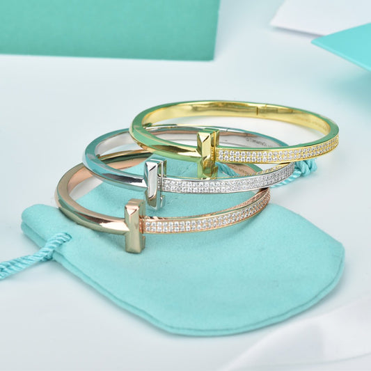 Tiffany Wide Cubic Zirconia Hinged Bangle