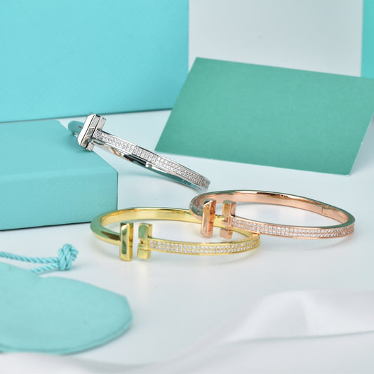 Tiffany Wide Cubic Zirconia Hinged Bangle