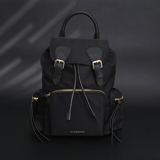 Burberry the Rucksack – Black Nylon & Leather Backpack with Gold-Tone Hardware - Black with Gold Accents